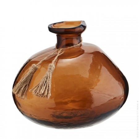 Clear glass vase with tassels