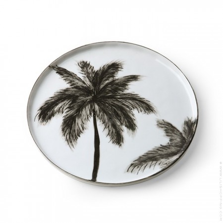 White ceramic serving tray and black palm