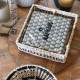 Natural and black seagrass napkin holder