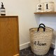 A laver woven palm leaf basket