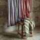 Checked and fringed black and beige throw