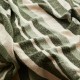 Checked and fringed black and beige throw