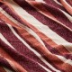 Checked and fringed black and beige throw
