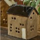 Beige and brown tealight white house