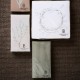 Pack of 16 tone in tone green stripped paper napkins