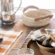 Black cotton and natural seagrass basket