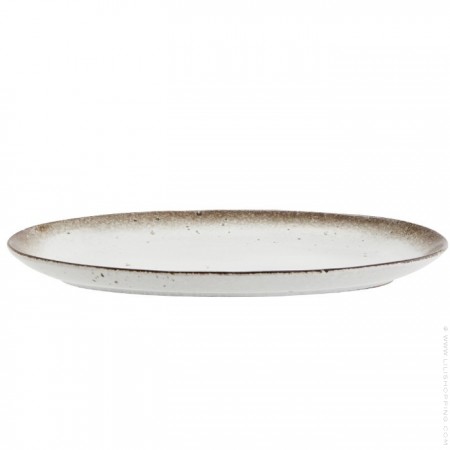 Plat rond en gr&egrave;s mouchet&eacute;