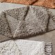 Tufted ivory and caramel stripped cotton bath mat