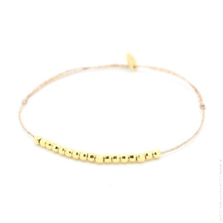 Gold platted cristals on a lurex Bracelet