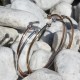 Gold platted bangle with 2 white zirconium