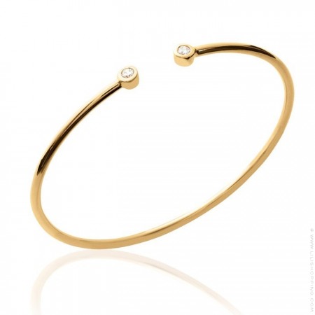 Gold platted bangle with 2 white zirconium