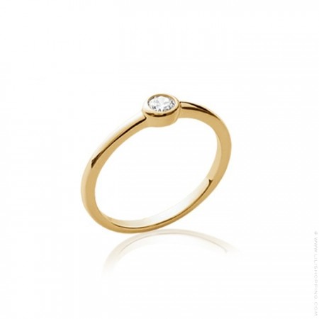 Gold platted ring with 2 white zirconium
