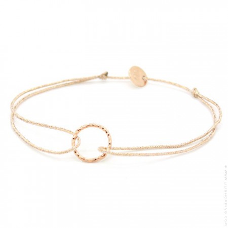 Pink gold platted hammered ring on a lurex Bracelet