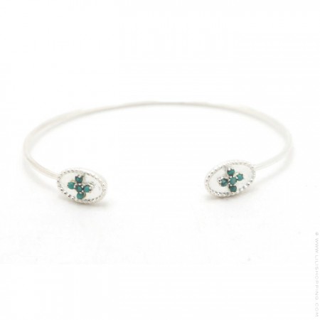 Silver bangle with green turquoise stones cross