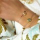 Turquoises and gold plated nuggets on a lurex Bracelet