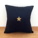 Square black linen cushion with a gold star